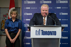 Toronto Mayor Rob Ford stands with his wife, Renata, at a news conference in Toronto. Photo / AP Toronto Mayor Rob Ford stands with his wife, Renata, at a news conference in Toronto. Photo / AP