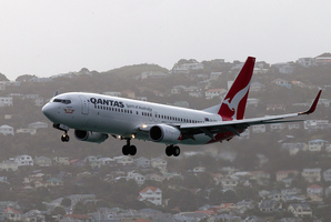 A Qantas aeroplane landing at Wellington airport photo/NZ Herald