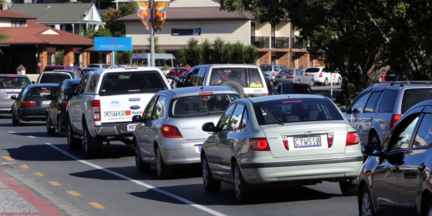 Traffic was backed up all the way from Onerahi Hill to the Town Basin due to resealing work. Photo/John Stone.