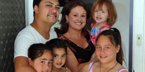 Kirsty Slack and Frank Vlamings and their blended family with five children are delighted to get a new home thanks to Habitat For Humanity. Photo/John Stone.