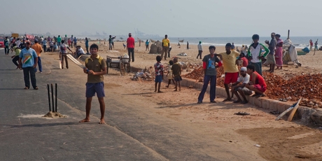 People playing street cricket. Photo / Derek Cheng