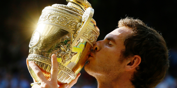 Andy Murray with the trophy after defeating Novak Djokovic in the Wimbledon final. Photo / AP