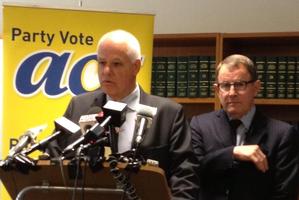 John Banks stands behind his party president John Boscawen. Photo / NZ Herald