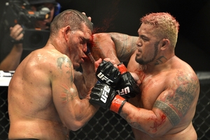 Mark Hunt hits Antonio 'Bigfoot' Silva with an elbow. Photo / Getty Images
