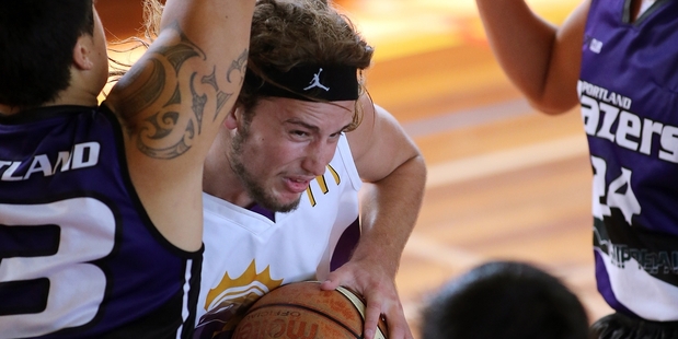 Raumanga Royals basketballer Klay Rouse looking for a way past in their clash with Portland. Photo/John Stone.