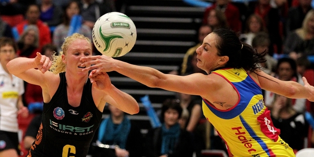 Laura Langman (left) was under pressure from Joline Henry during the 2012 ANZ Championships. Expect more of the same in March. PHOTO/FILE