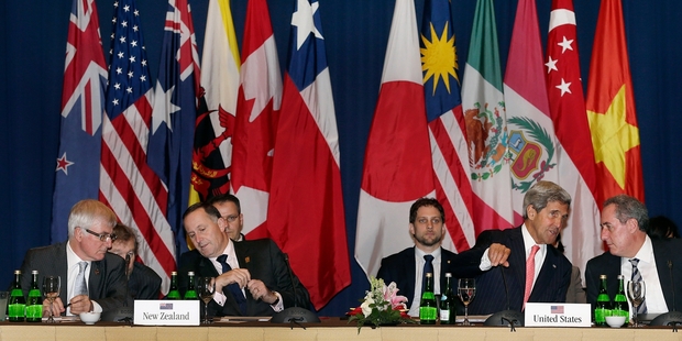 Trade Minister Tim Groser (left), with Prime Minister John Key at Trans-Pacific Partnership talks, could be set to deliver a good deal for New Zealand this weekend. Photo / AP