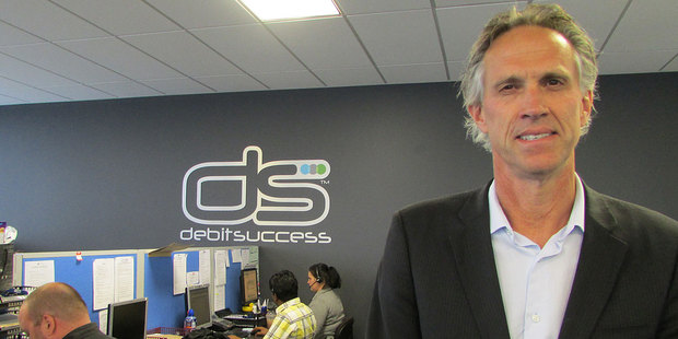 Debitsuccess turnover has topped $1billion for the first time in a year said chief executive Craig Marshall.