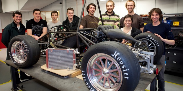 The car and the team. From left: Sean Keller, Jason Van Winkel, Tim Mead, Liam Byron, Michael Butler, Dino Kudrass, Abby Neave, Andrew Sarratt and Dave Newell.