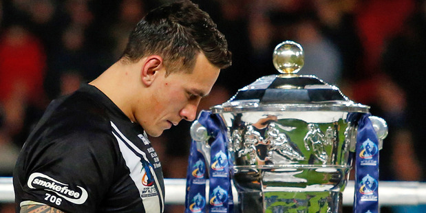 Sonny Bill Williams walks past the rugby league World Cup trophy. Photo / Getty Images