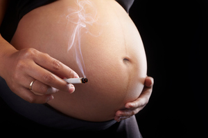 Smoking while pregnant can cause serious damage to the baby's cells. Photo / Thinkstock