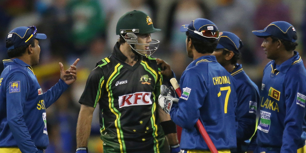 Glenn Maxwell has words with the Sri Lankan team after the final ball of the game. Photo / Getty Images