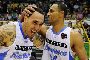 Leon Henry (L) and Mika Vukona of the Breakers celebrate after winning the round 14 NBL match between the Townsville Crocodiles and the New Zealand Breakers. Photo /Getty Images.