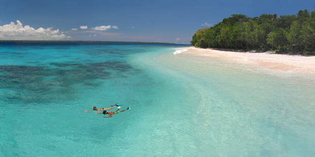 Peering into the clear depths at Bokissa Private Island Resort off Espiritu Santo. Photo / Elisabeth Easther