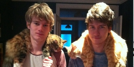 Lynley Sheweiry writes: "My sons, Michael and Troy Banbury, wearing their cats Alley and Dexter as scarves after a hard day of hunting NZ wildlife." Photo / Supplied