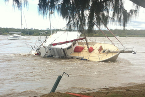 A boat at the mouth of the Boyne River near Gladstone. Photo / Supplied