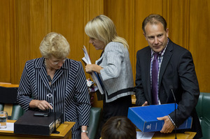 Dumped ministers Kate Wilkinson and Phil Heatley make way as newly promoted minister Nikki Kaye moves to her seat. Photo / Mark Mitchell