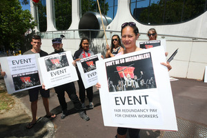 Event Cinema worker Mel Johnston protests with colleagues outside the Auckland headquarters. Photo / Chris Gorman