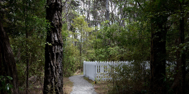 The final resting place for three victims of the Orpheus disaster, a short distance from Cornwallis Beach. Photo / David White