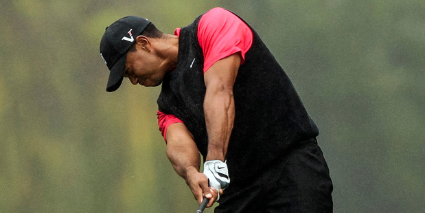 Woods has won 49 of the 53 times when he has held at least a share of the third-round lead. Photo / AP