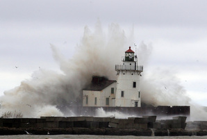 Rising oceans will make a merciless attack on man-made structures. Photo / AP