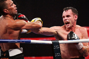 Daniel Geale lands a right on Anthony Mundine during their IBF Middleweight Title bout. Photo / Getty Images