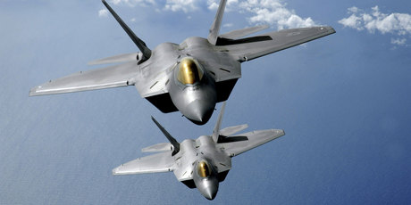 A plunge in defence spending unexpectedly pushed the US economy into negative territory in the last quarter of 2012. Photo / F-22 Raptors / Thinkstock