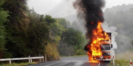 The driver of this truck jumped out moments before it burst into flames.