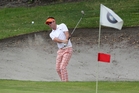Josh Geary blasts out of a bunker on the 18th at Mount Maunganui. Photo/John Borren. Josh Geary blasts out of a bunker on the 18th at Mount Maunganui. Photo/John Borren.
