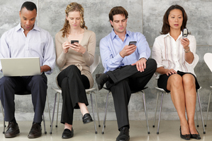 Phone addicts are likely to be less happy than people who don't look at calls or text messages, a new study shows. Photo / Thinkstock
