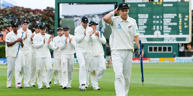 New Zealand bowler Trent Boult leads the triumphant Kiwis off the Basin Reserve after his stunning performance in the second cricket test yesterday. Photo / Getty Images