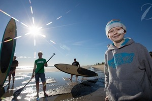Friends hope to raise $35,000 for Harrison Mundy (R) by paddling down the Waikato River over four days. Photo / supplied
