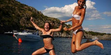 Enjoying Italy's hidden bays and crystal-clear waters. Photo / John Kirwan