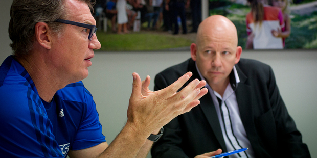 Sir John Kirwan acting as guest editor for the New Zealand Herald. Pictured in the afternoon news conference with editor Shayne Currie. Photo / Sarah Ivey