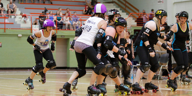 The Sulphur City Steam Rollers (in white) recorded their first victory at the weekend in the club's short history. Photo/Brian Moffat.