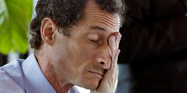 New York mayoral candidate Anthony Weiner rubs his eyes during a candidate forum. Photo / AP