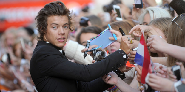 Does 1D member Harry Styles want to go solo? Photo / AP