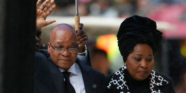 South African President Jacob Zuma was greeted by the crowd booing at he arrived at the memorial service for Nelson Mandela. Photo / AP