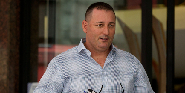 Businessman Phillip John Smart leaves the Auckland District Court where he is facing charges for misrepresenting customers buying water filters. Photo / NZ Herald