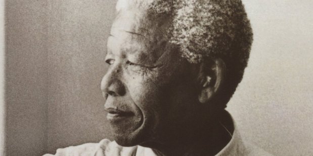 Mandela revisits his jail cell on Robben Island. Photo / file