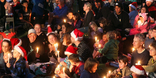The annual Christmas Carols by Candlelight in Kuirau Park is a family event to celebrate the festive spirit. Photo / Stephen Parker
