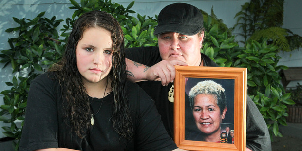 Boston Pollock and her mother Tamsta holding a photograph of her mother Dolly Pollock. Photo/Warren Buckland