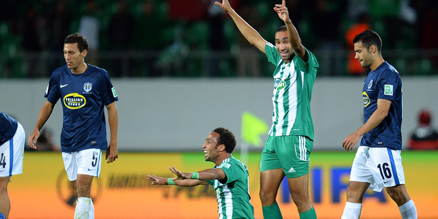 Issam Erraki and Mohamed Oulhaj of Casablanca celebrate after beating Auckland City. Photo /Getty Images