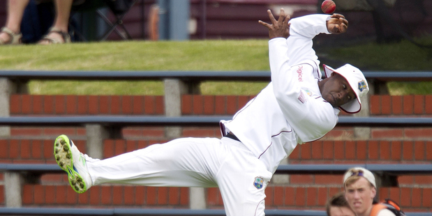 Tino Best of the West Indies drops a catch from Trent Boult. Photo / Getty Images