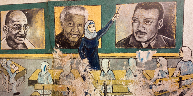 Mural on the wall of one of the universities in Gaza City featuring Nelson Mandela - learning about international heroes for social justice. Photo/Roger Fowler.