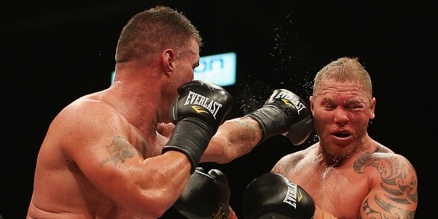 Shane Cameron took more punishment in his defeat by American Brian Minto when the two squared up in Auckland on Saturday night. Photo / Getty Images