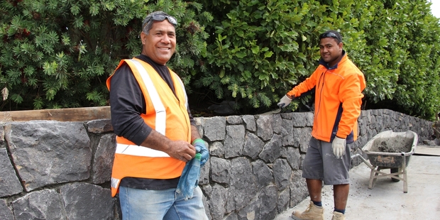 Lemeki "Mack'' Tagi (left) and his son Hani - a chip off the old block - have built walls all over the city and even in Fiji.