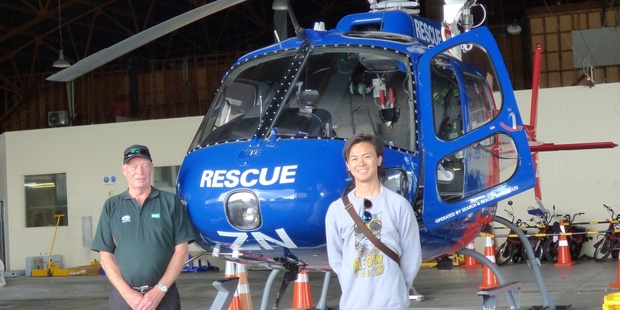 Peter Davies (left), store manager for RD1 Pahiatua, was in one of the sponsors' seats in the rescue helicopter for the day, along with Suzuki NZ representative Teppei Harada.