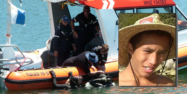 Police divers searching yesterday for the body of Lance Tikitere Fitzgerald (inset). PHOTO: Greg Taipari