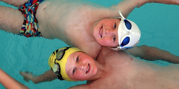 Brothers Liam (white cap) and Daniel Shanahan qualified for the Jet Star Swim Champs. Photo/Andrew Warner